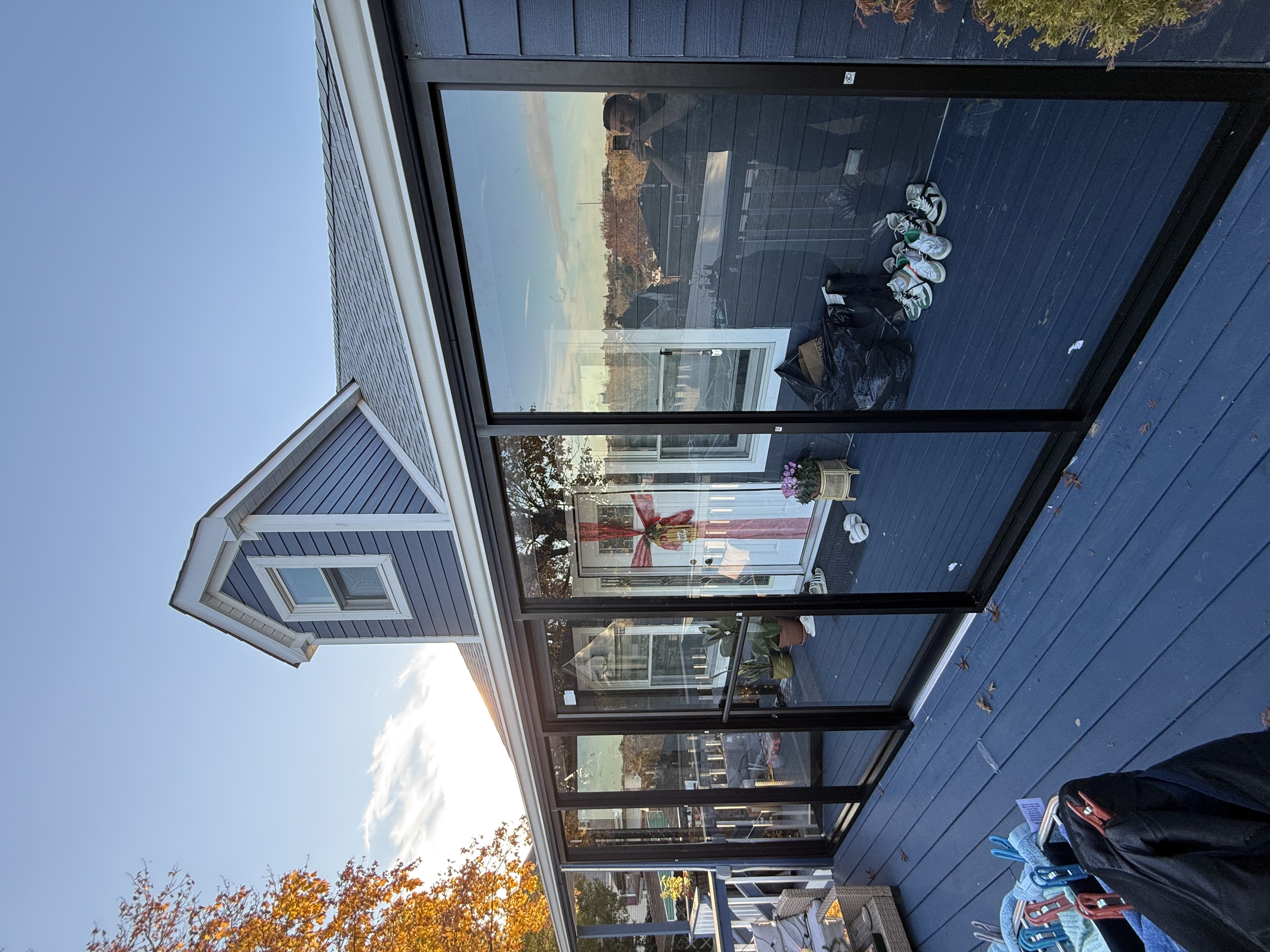 Exterior glass enclosure with black metal framing